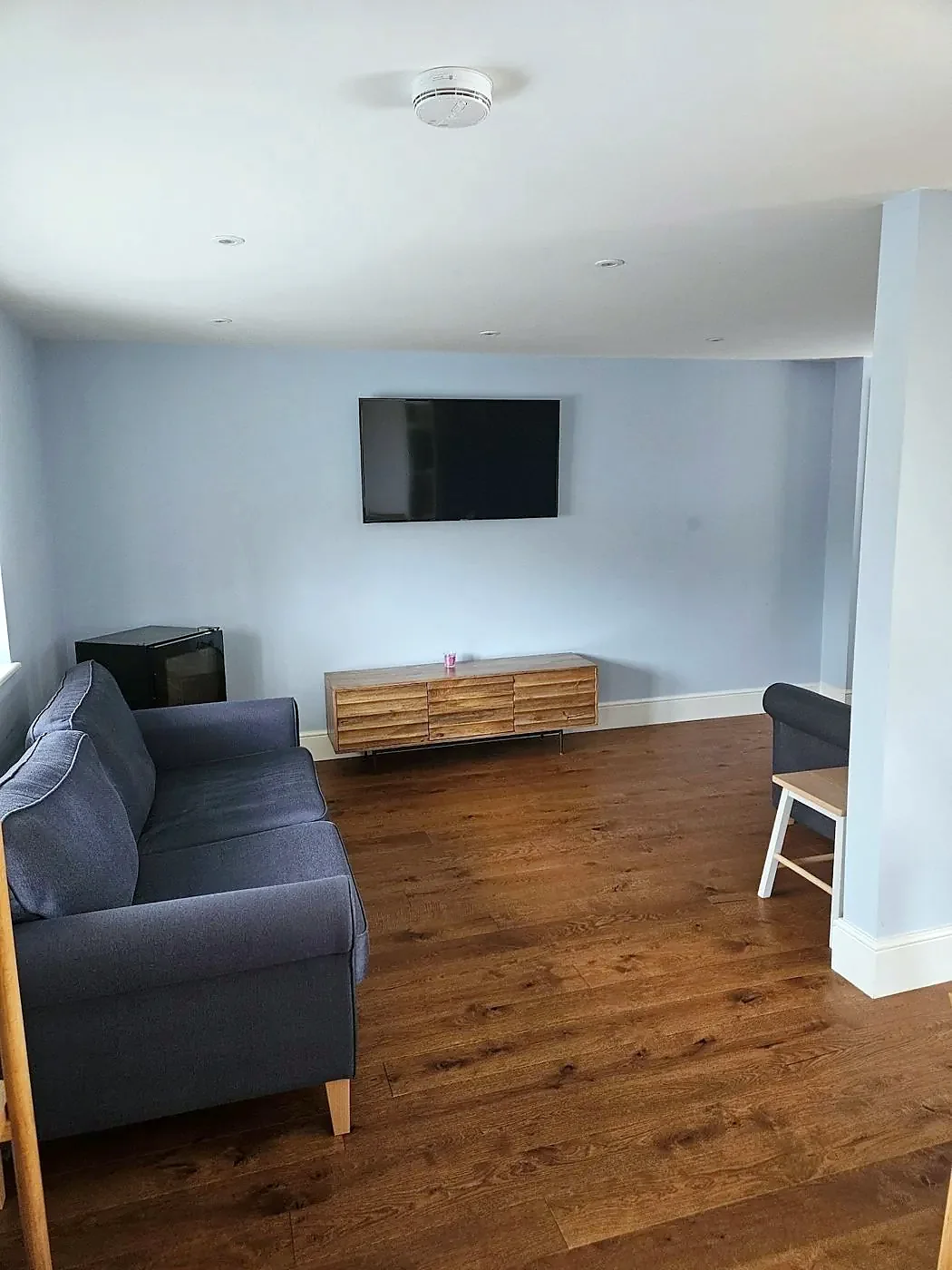 The warm and welcoming living area at Little George